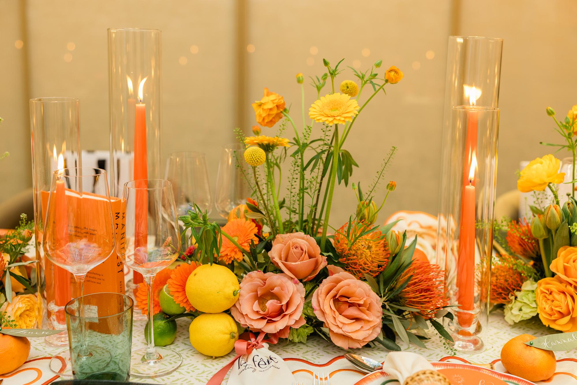Tall glowing candles as table centres