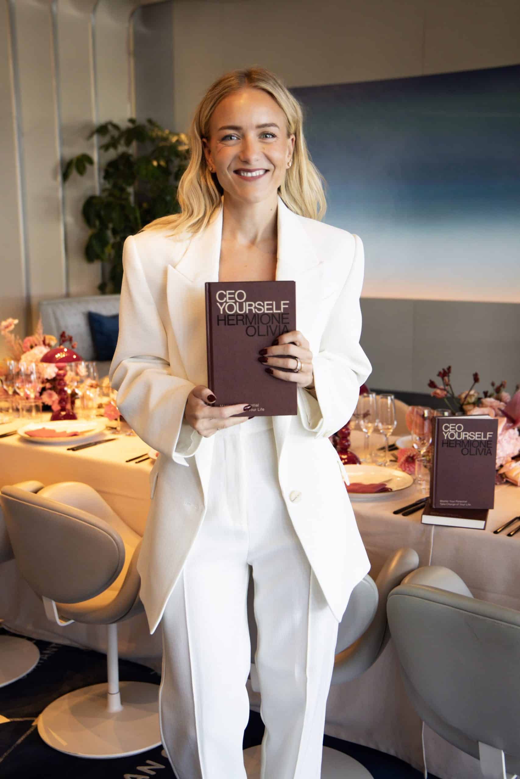 Hermione Olivia holding CEO yourself book peninsula london